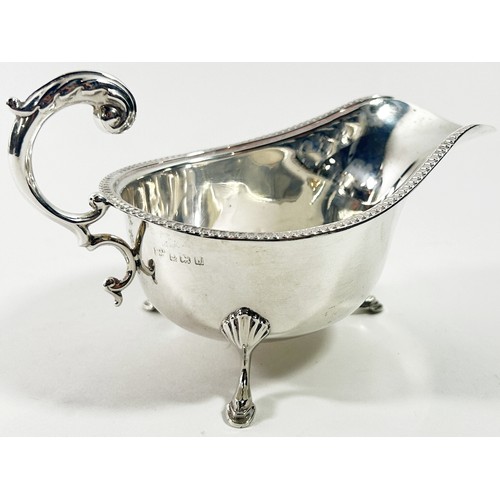 260 - A Georgian style silver gravy boat, Birmingham 1933, maker S Blanckensee & Son Ltd, 2.7 ozs approxim... 