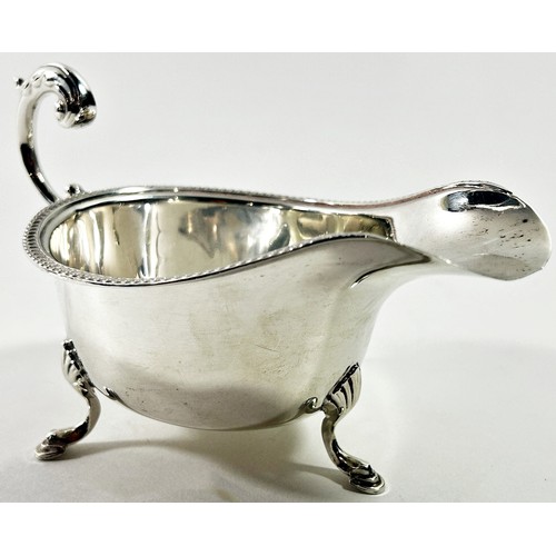 260 - A Georgian style silver gravy boat, Birmingham 1933, maker S Blanckensee & Son Ltd, 2.7 ozs approxim... 