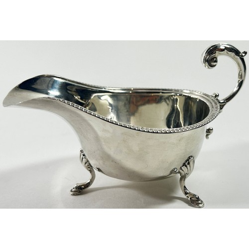 260 - A Georgian style silver gravy boat, Birmingham 1933, maker S Blanckensee & Son Ltd, 2.7 ozs approxim... 