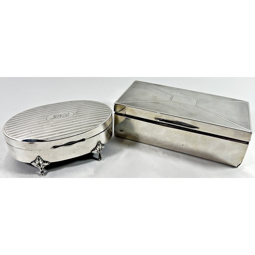 262 - An oval silver trinket box, Birmingham 1925 together with a silver cigarette box and six silver tea ... 