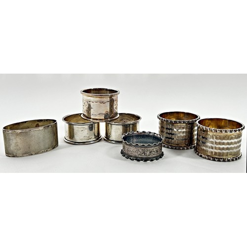 236 - Seven silver napkin rings, including two pairs, 5oz approximately