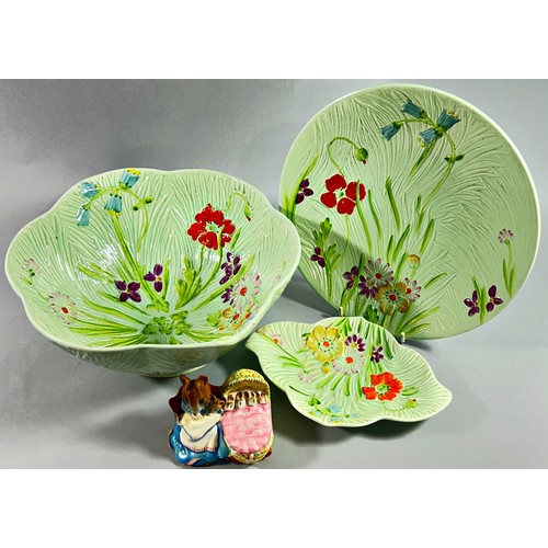 64 - A Beswick leaf pattern and floral salad bowl with two matching dishes and a Beatrix Potter Hunca Mun... 