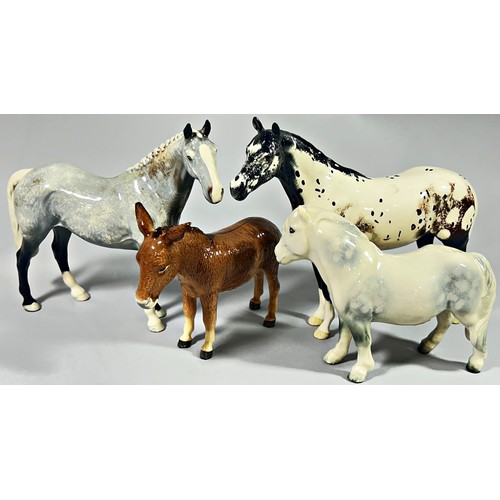 101 - Three Beswick horses to include an Appaloosa, A Grey and a moorland pony, donkey etc