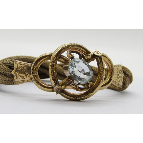 333 - 19th century yellow metal and woven hairwork mourning bracelet set with an oval pale aquamarine, wit... 