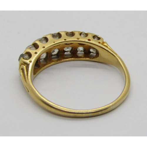 338 - Antique yellow metal double row diamond ring, set with fourteen old-cut stones in total, size N, 3.3... 