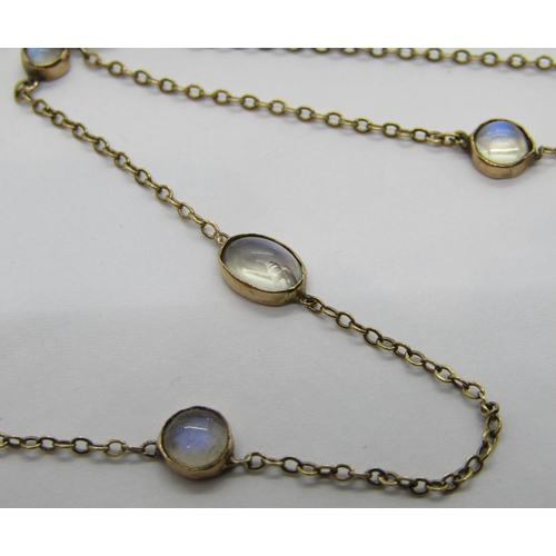 340 - Edwardian yellow metal chain necklace collet set with nine oval and round cabochon moonstones, 3.5g