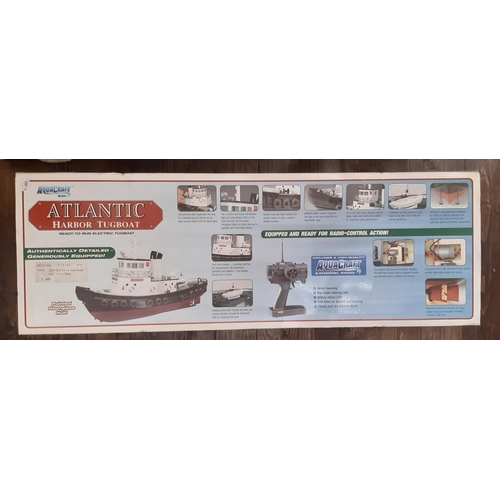 717 - Boxed radio controlled Harbour Tugboat 'Atlantic' by Aquacraft Models with painted fibreglass hull, ... 