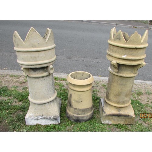 1008 - Two similar buff coloured cylindrical crown-top chimney pots (af) 92 cm high together with a further... 