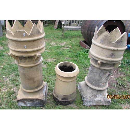 1008 - Two similar buff coloured cylindrical crown-top chimney pots (af) 92 cm high together with a further... 