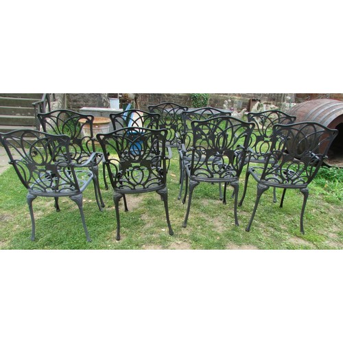 1056 - A mat painted cast aluminium garden terrace table over oval form with decorative pierced and scrolli... 