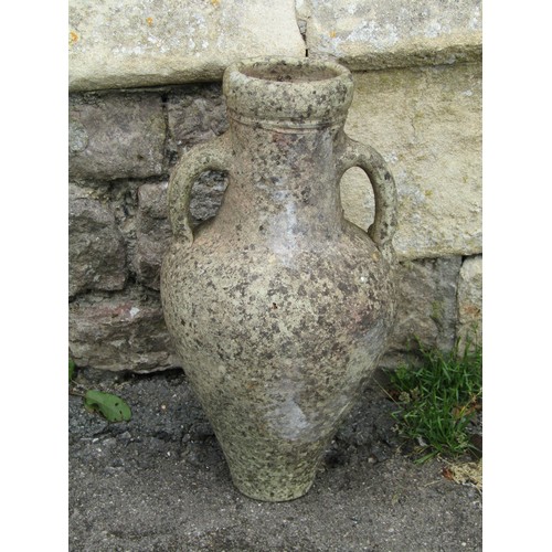 1106 - Two small weathered clay vessels with moulded loop handles (varying design), the largest amphora typ... 