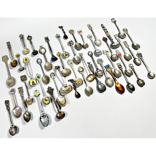 219 - A large quantity of silver plated Souvenir spoons, together with a cased sets of silver plated goble... 