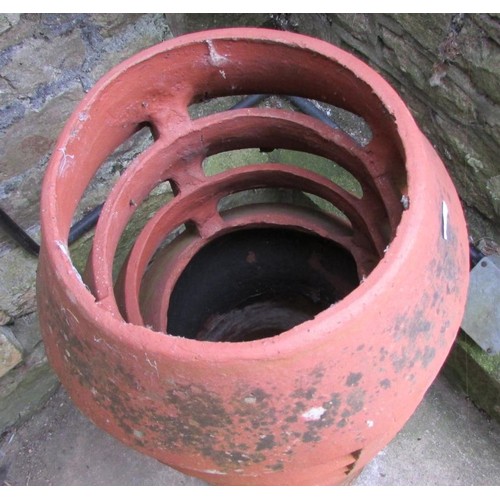 1025 - A weathered terracotta cylindrical chimney pot with vented top (af) later adapted as a planter 90 cm... 