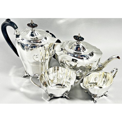 227 - A four piece silver plated tea service, a circular silver plated tray 39cm diam, a pair of three lig... 