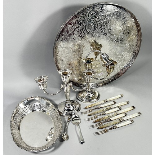 227 - A four piece silver plated tea service, a circular silver plated tray 39cm diam, a pair of three lig... 