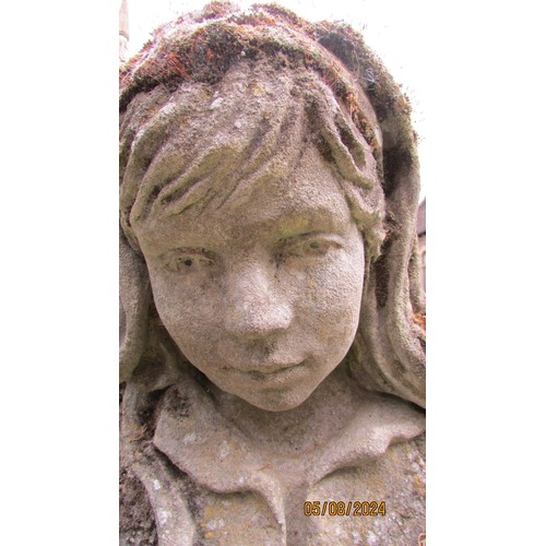 1019 - A well weathered moss encrusted garden ornament in the form of  a girl/young woman in seated pose re... 