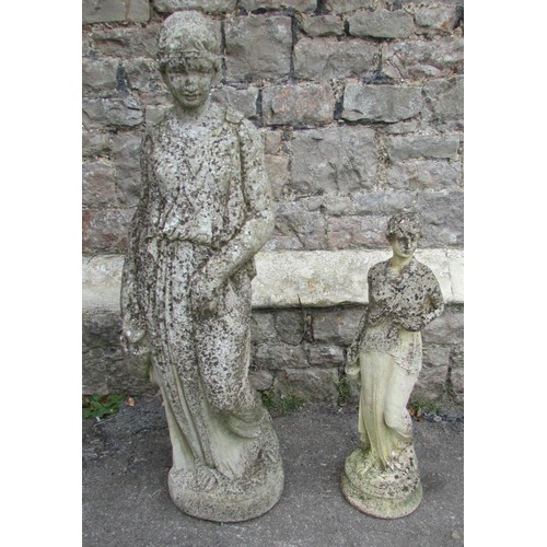 1023 - A weathered cast composition stone garden ornament/statue of a classical water maiden 100 cm high to... 