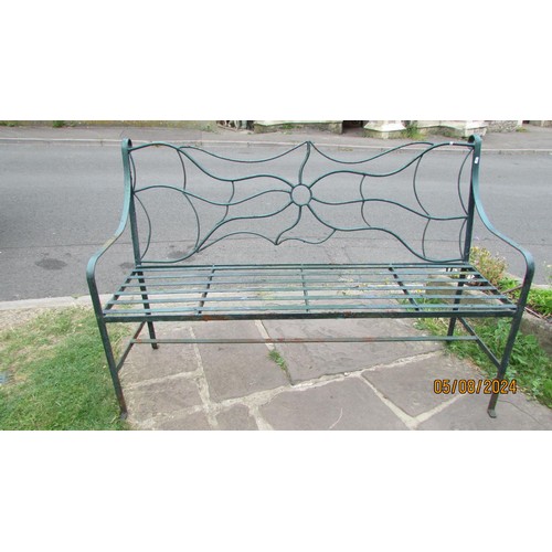 1073 - A Regency style painted and weathered steel strapwork garden bench with decorative pierced back, 147... 