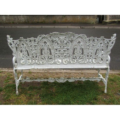 1069 - A good quality cream painted and weathered heavy gauge cast metal three seat garden bench with decor... 