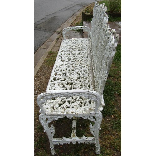 1069 - A good quality cream painted and weathered heavy gauge cast metal three seat garden bench with decor... 