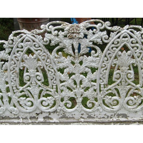 1069 - A good quality cream painted and weathered heavy gauge cast metal three seat garden bench with decor... 