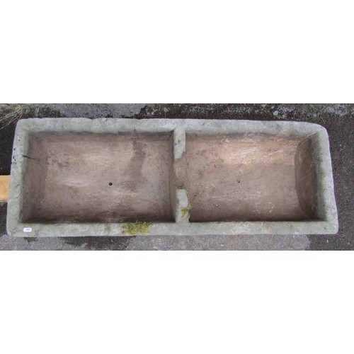 1103 - A weathered carved natural stone planter of two divisional rectangular form, 19cm high, 108 x 39cm. ... 