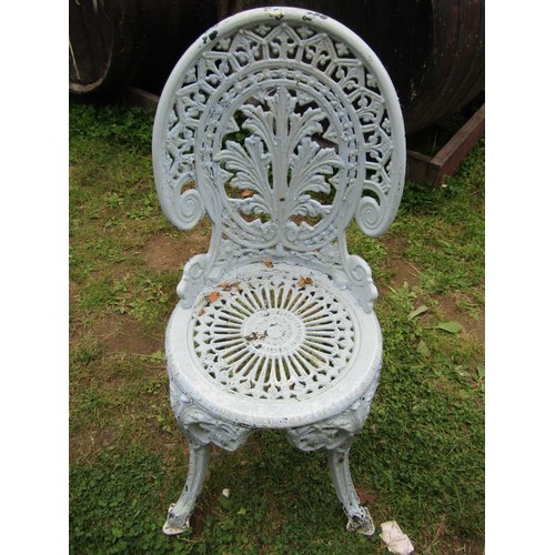 1058 - A painted and weathered cast aluminium garden terrace table of circular form with decorative pierced... 