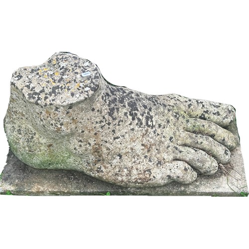 1061 - A large reconstituted stone foot, 42cm high x 81cm long x 36cm wide approx