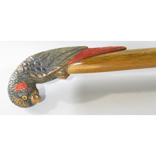 430 - Four walking sticks with carved wood Parrot head handles