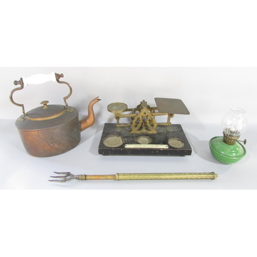 439 - A miscellaneous collection of items including a jam pan, copper kettle, scales, bellows, oil lamps, ... 