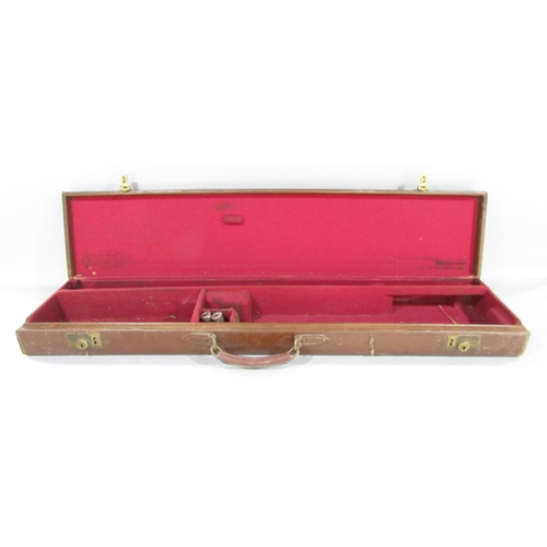 443 - A vintage pig skin rifle case, a vintage mahogany gun case and an old leather gun case.