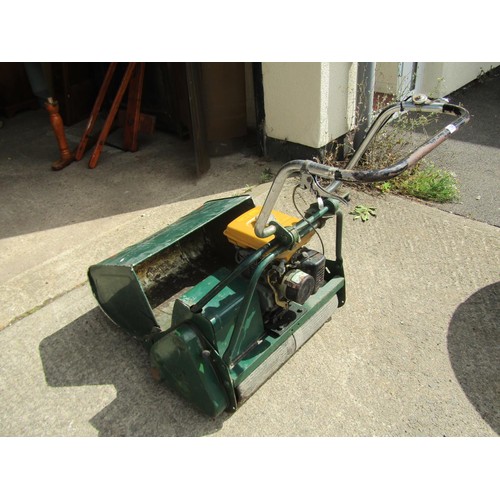 1099 - A petrol driven cylinder lawn mower with Robin EY15 engine 24 inch cut, rear and front roller, compl... 