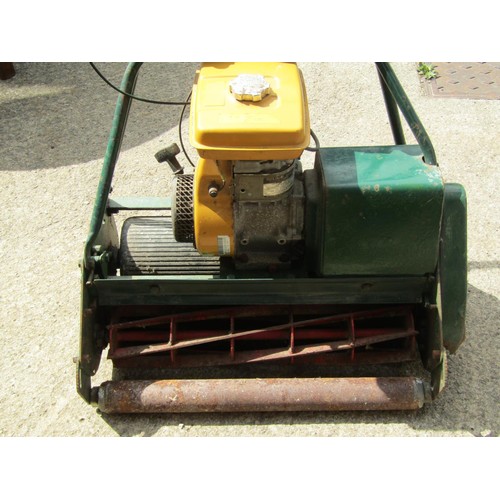 1099 - A petrol driven cylinder lawn mower with Robin EY15 engine 24 inch cut, rear and front roller, compl... 