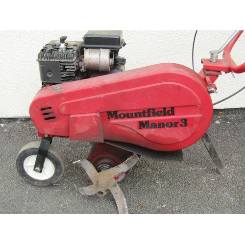 1100 - A Mountfield 'Manor 3' petrol driven garden rotovator with Briggs & Stratton three horse power engin... 