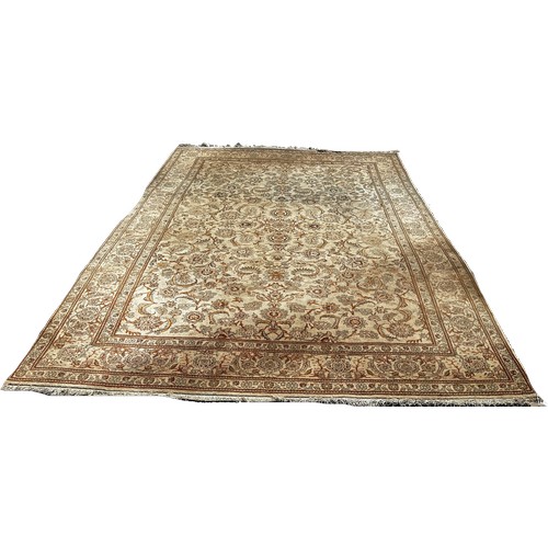 1792 - A Middle Eastern hand made carpet circa 1950’s, with a scrolled floral pattern on a ivory ground, 32... 