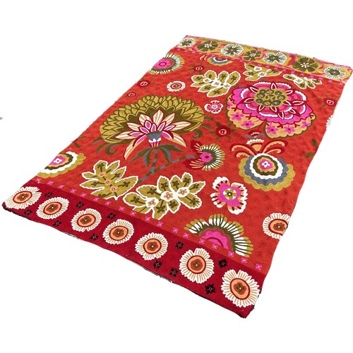 1794 - A brightly coloured floral Crewel work tapestry 180cm x 118cm approximately