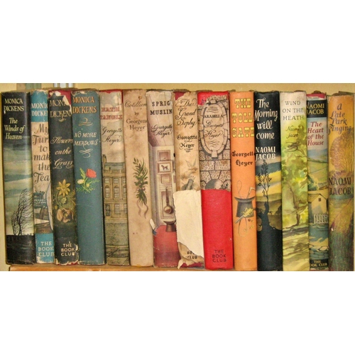 636 - An extensive library of mid 20th century novels, in original dust jackets, including Georgette Heyer... 