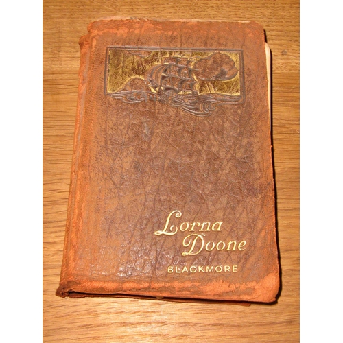 639 - A collect of editions of Lorna Doone, A Romance of Exmoor by R D Blackmore: a small tan leather boun... 