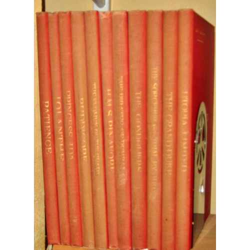 642 - Eleven late 19th century volumes of Savoy Edition Gilbert and Sullivan vocal scores bound in red clo... 