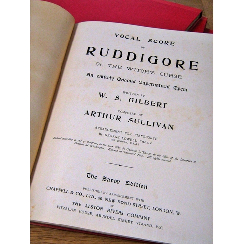 642 - Eleven late 19th century volumes of Savoy Edition Gilbert and Sullivan vocal scores bound in red clo... 