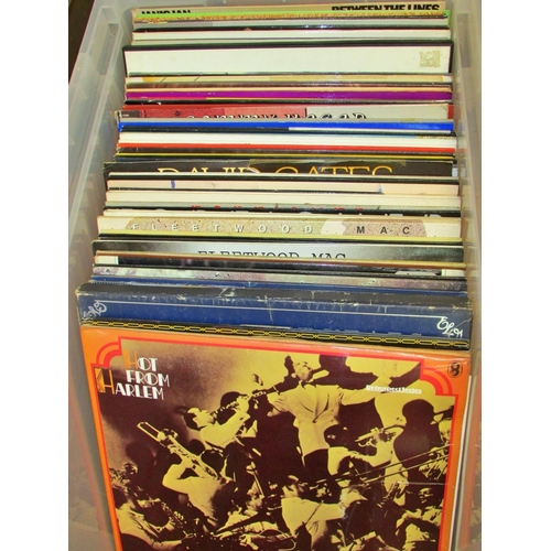 663 - An extensive collection of 60s, 70s and 80s albums to include Fleetwood Mac, Genesis, George Harriso... 