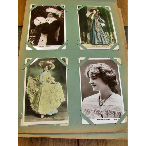 676 - A collection of late Victorian and early 20th century postcards in two albums to include famous actr... 