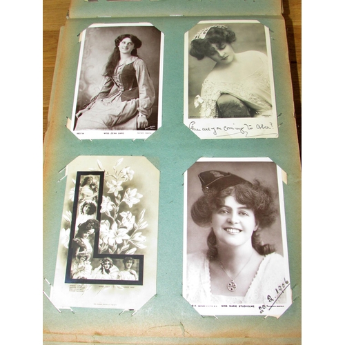 676 - A collection of late Victorian and early 20th century postcards in two albums to include famous actr... 