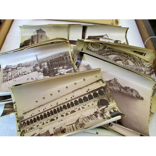 688 - A quantity of old photographs of European cities and coastlines, in particular Italy and France