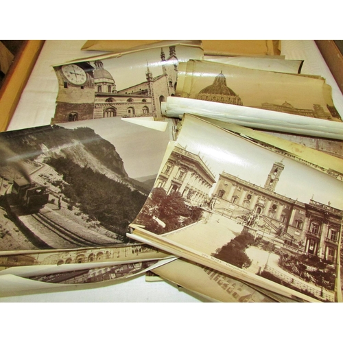 688 - A quantity of old photographs of European cities and coastlines, in particular Italy and France