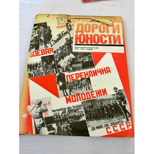 689 - A collection of Soviet Union interest to include a book on early 20th century Soviet art, a folio of... 