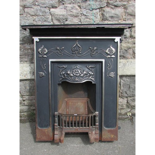 1134 - An Art Nouveau cast iron fire surround, 102 x 90cm.