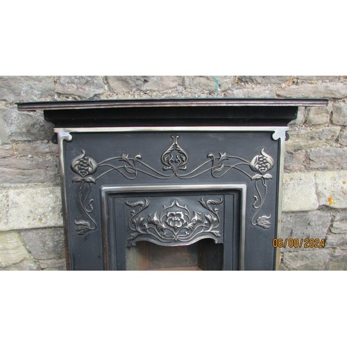 1134 - An Art Nouveau cast iron fire surround, 102 x 90cm.