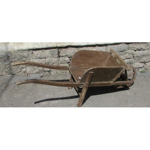 1136 - A child’s size painted wooden wheelbarrow.