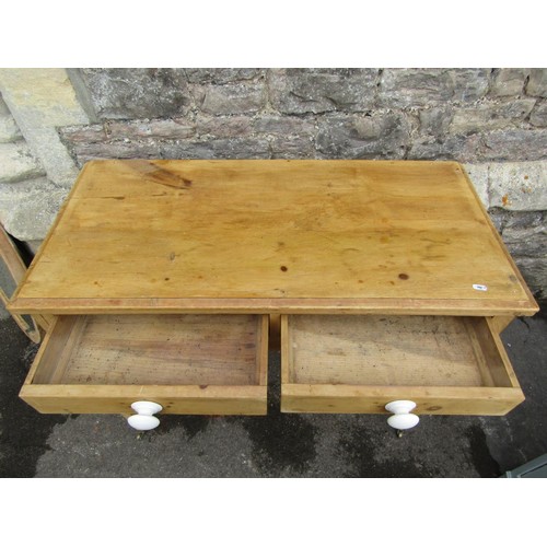 1147 - A small stripped pine side table, an over painted coffer and a pine framed oval mirror (3)